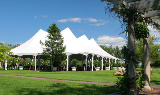 White tents on the lawn at Oak Hill